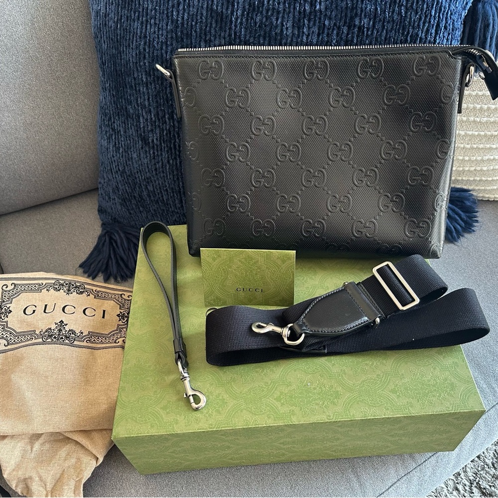 Gucci GG Embossed Messenger Bag